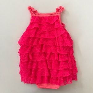 Cherokee lace design ruffled onesie.